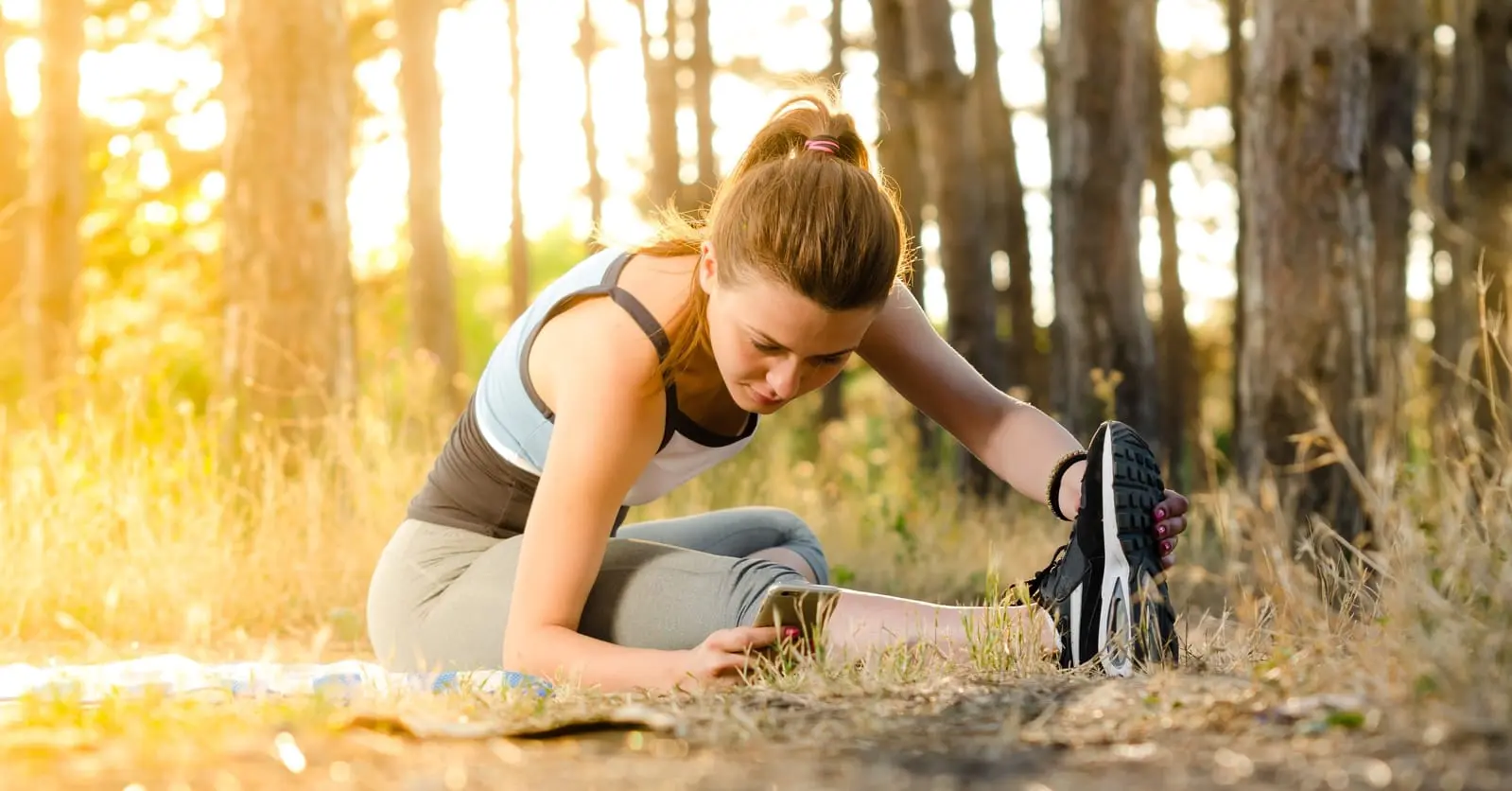 Woman stretches for better health after seeing a chiropractor in burbank ca