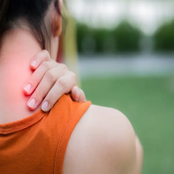 woman having neck pain