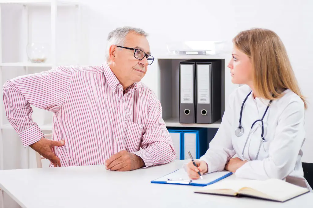 patient and doctor speaking to each other