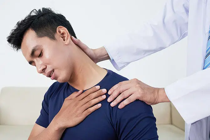Patient receiving chiropractic treatment at Allied Pain & Wellness