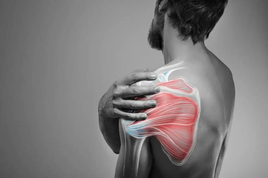 man suffering from muscle strain