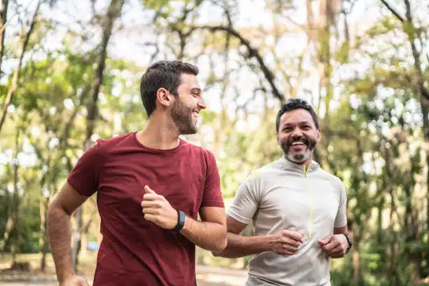 Two young men with a healthy body doing some outdoor workout.