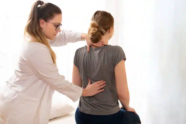 Chiropractic care adjustment for back pain