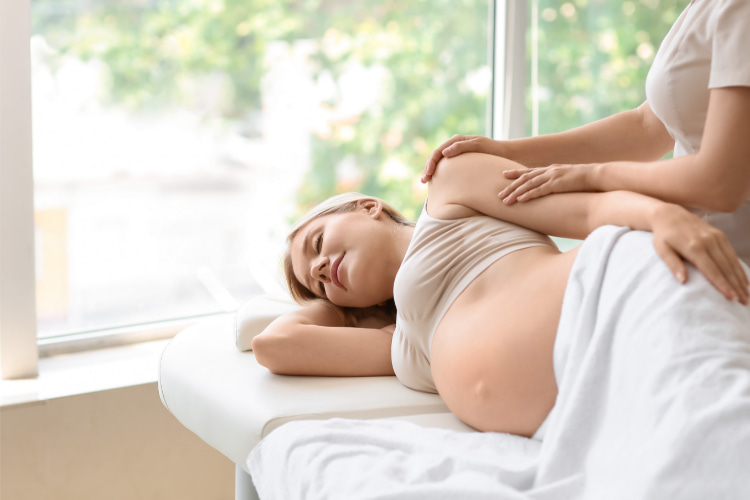 Expecting mother getting Prenatal Chiropractic Care