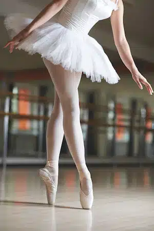 ballerina balancing on tiptoe