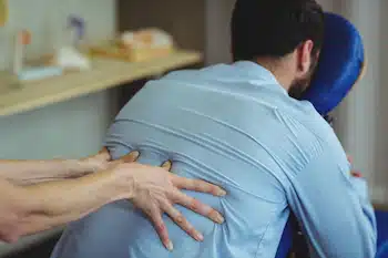 back muscle stiffness experienced by patient at chiropractic clinic