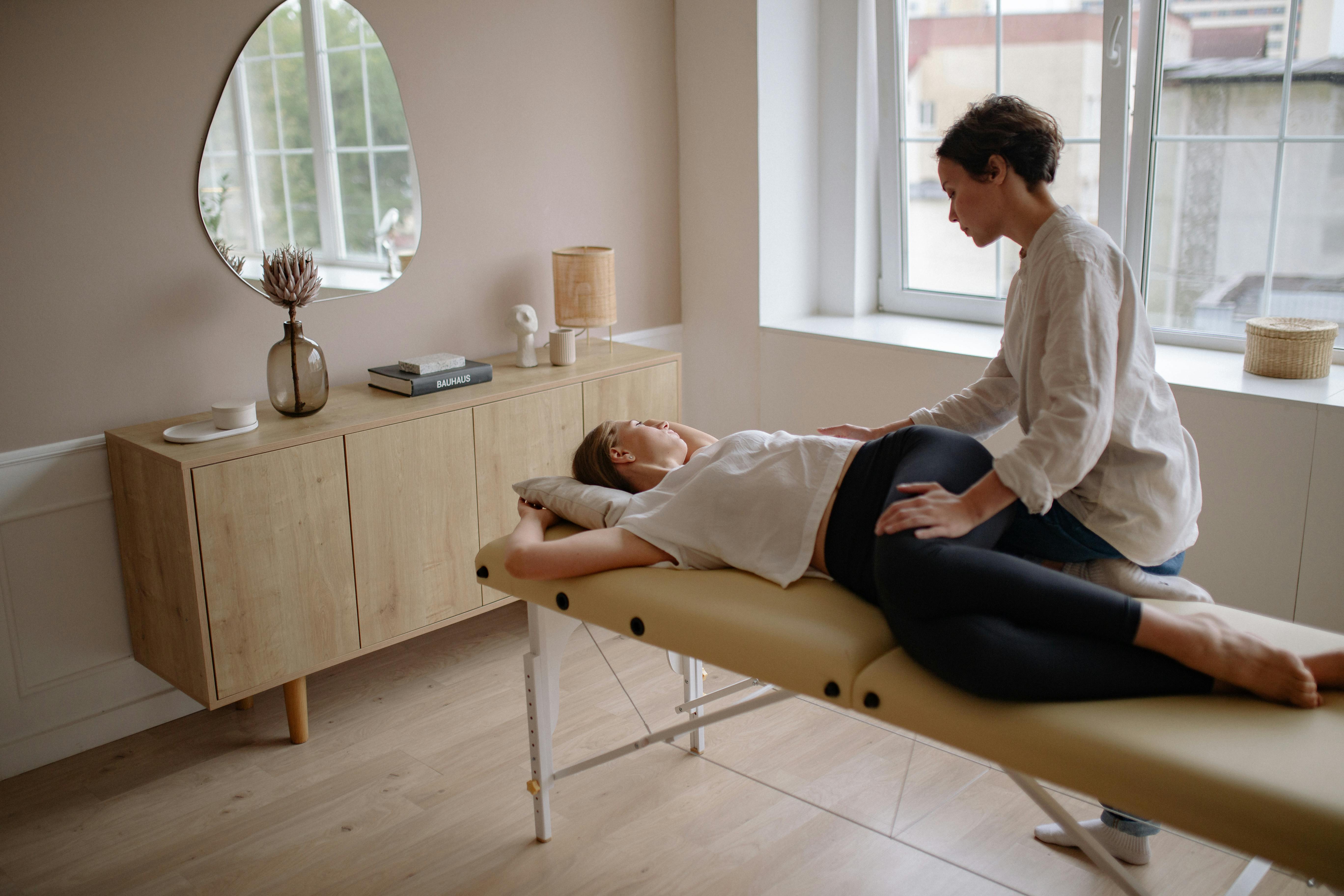 woman combining chiropractic care and massage therapy for prevention of long-term complications